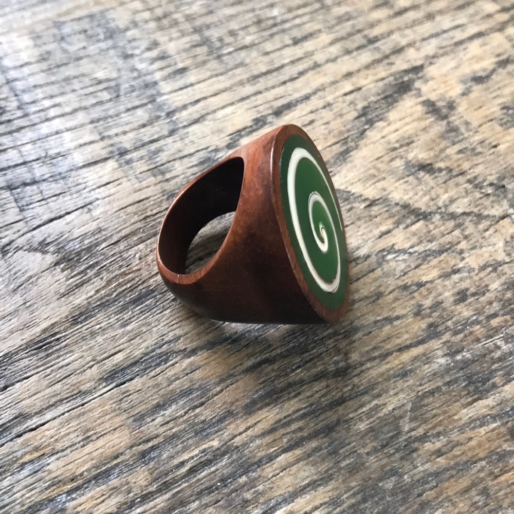Natural wooden ring with green inlay